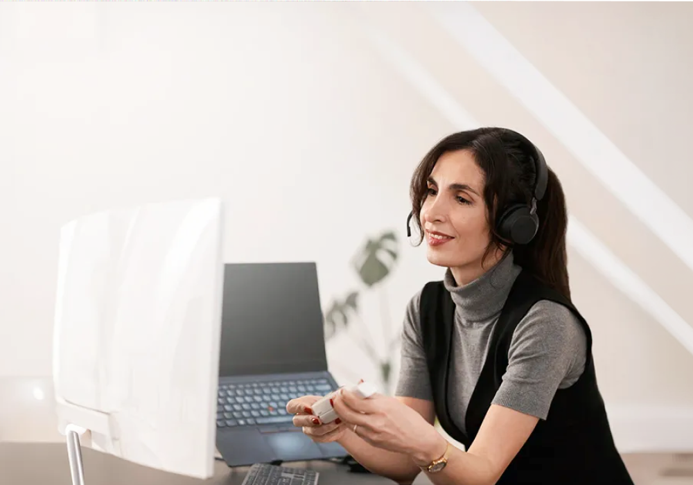 Woman using computer in office