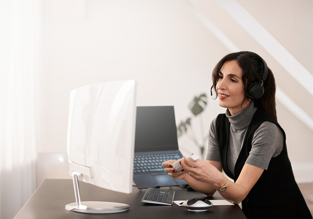 Woman using computer in office